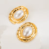 Wholesale Exaggerated Geometric Alloy Raffia Pearl Inlaid Oval Stud Earrings For Women
