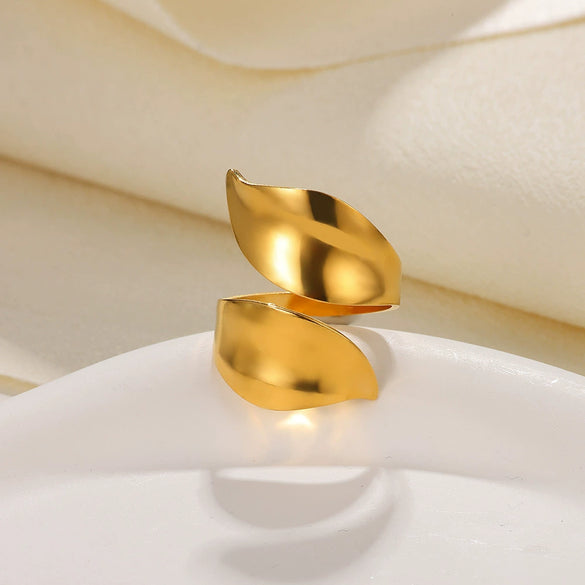 Wholesale Exaggerated Geometric Hollow Flower Stainless Steel 18K Goldplated Asymmetric Ring For Women With Leaves And Wave Pattern