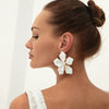 Wholesale Exaggerated Iron And Dripping Oil Flower Earrings With Electroplating