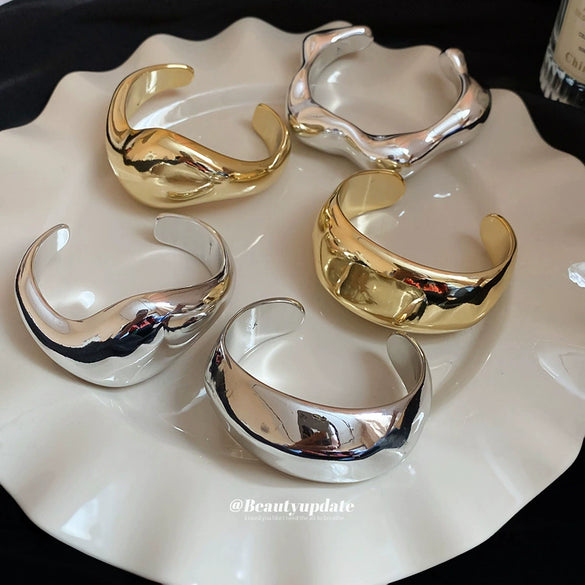 Wholesale Exaggerated Irregular Geometric Smooth Twisted Open Bracelet In Mixed Materials With Electroplating