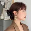 Wholesale Exaggerated Irregular Pleated Geometric Electroplated Copper Earrings For Women