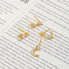 Wholesale Fashion Asymmetric Star Moon Earrings Brass With Zircon