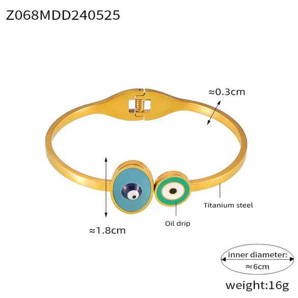 Wholesale Fashion Blue Eye Pattern Round Titanium Steel Goldplated Spring Bracelet Jewelry