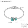 Wholesale Fashion Blue Eye Pattern Round Titanium Steel Goldplated Spring Bracelet Jewelry
