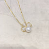 Wholesale Fashion Minimalist Freshwater Pearl Necklace With Copper Opal Clover Pendant Flat Round And Bun Round Pearl Shapes