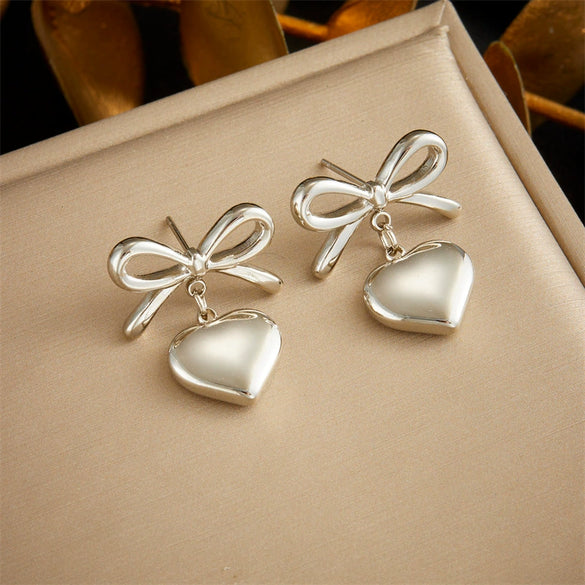 Wholesale Fashion Niche Design Goldplated Stainless Steel Heart Bow Love Pendant Hanging Earrings For Women