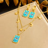 Wholesale Fashion Oil Dripping Stainless Steel Star Moon Pendant Stacked Necklace And Earrings For Women