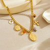 Wholesale Fashion Women's Stainless Steel And Titanium Steel Jewelry Set With Cross Crown And Roman Numerals Pattern Gold Plated Oval Relief Pendant