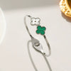 Wholesale Female Fashion Fourleaf Flower Titanium Steel Open Bracelet With Polishing Treatment And Nonfading Feature