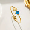 Wholesale Female Fashion Fourleaf Flower Titanium Steel Open Bracelet With Polishing Treatment And Nonfading Feature