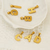 Wholesale Female Gold Electroplated Titanium Steel Pendant With Letter Number Text Design