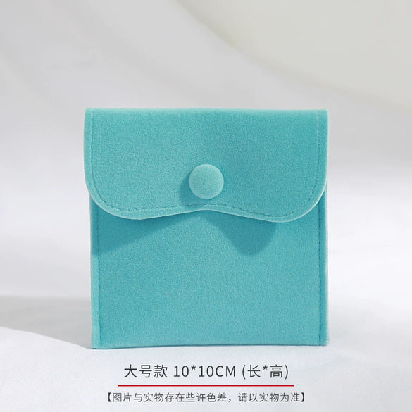 Wholesale Flannel And Velvet Jewelry Storage Bags With Anti Oxidation Buttons And Silk Screen Printing