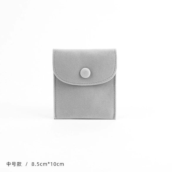Wholesale Flannel And Velvet Jewelry Storage Bags With Anti Oxidation Buttons And Silk Screen Printing