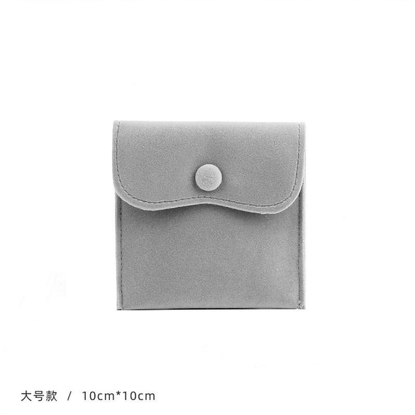 Wholesale Flannel And Velvet Jewelry Storage Bags With Anti Oxidation Buttons And Silk Screen Printing