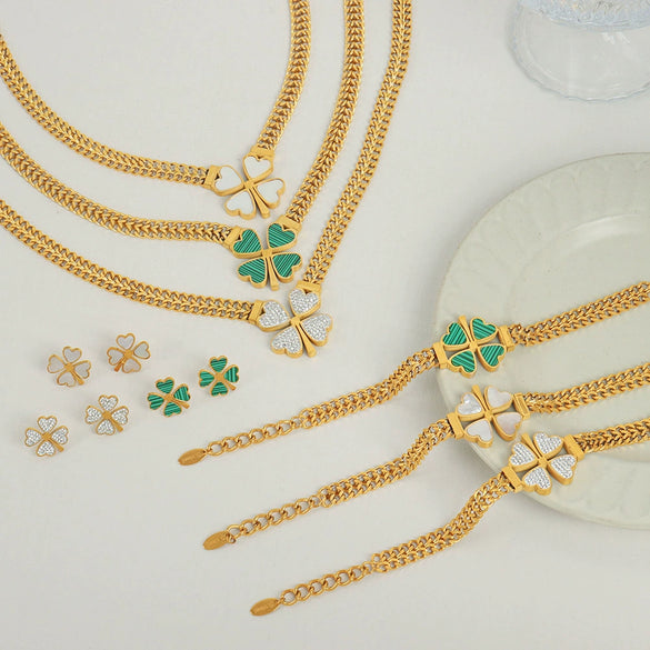 Wholesale Fresh Pastoral Style Creative Titanium Steel Set With Clover Flower Pattern Bracelet Necklace Ear Studs Electroplated