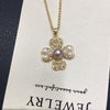 Wholesale Freshwater Pearl Necklace With Copper Accessories And Four Leaf Clover Zircon Pendant Flat Round And Bun Round Pearl Shapes Fashion And Minimalist Style