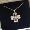 Wholesale Freshwater Pearl Necklace With Copper Accessories And Four Leaf Clover Zircon Pendant Flat Round And Bun Round Pearl Shapes Fashion And Minimalist Style