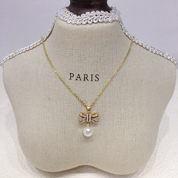 Wholesale Freshwater Pearl Necklace With Copper Microinlaid Zircon Bow Pendant Flat Round And Bun Round Shapes Fashion And Minimalist Style
