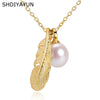 Wholesale Freshwater Pearl Pendant Clavicle Chain With Retro Feather Design Copper 18K Gold Plated Rice Shape And Droplet Shape Necklace