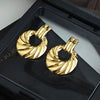 Wholesale Geometric Asymmetrical Spiral Pattern Titanium Steel Earrings With Electroplating Design