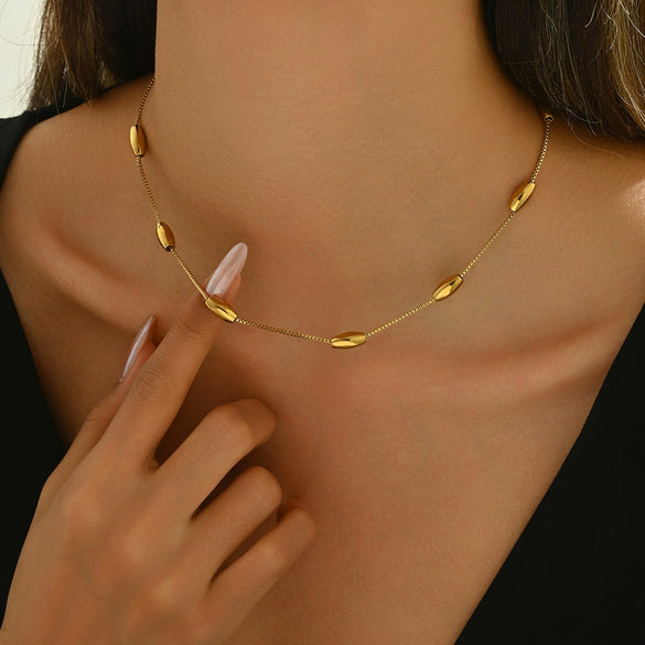 Wholesale Geometric Electroplated Stainless Steel Oval Hollow Ball Necklace For Men And Women