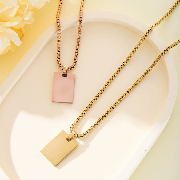 Wholesale Geometric Stainless Steel And Pearl Pendant Necklace With Electroplating