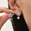 Wholesale Geometric Stainless Steel And Zircon Electroplated Five Leaf Flower Water Drop Ferris Wheel Earrings For Women