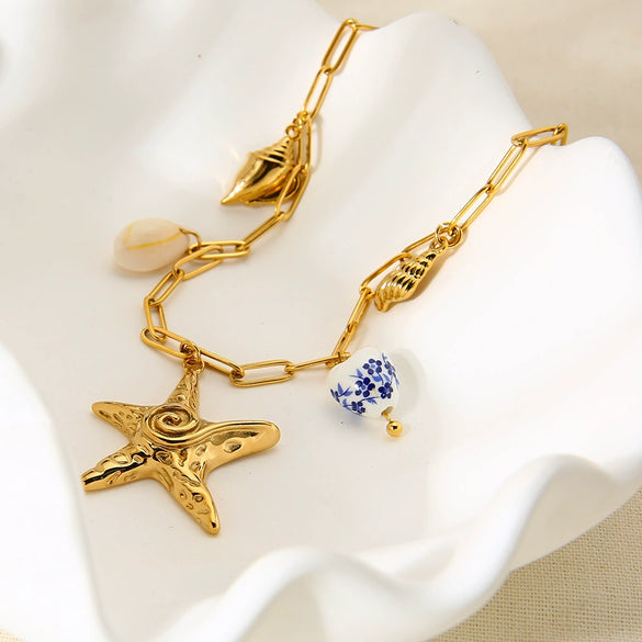 Wholesale Geometric Stainless Steel Conch And Starfish Pendant Cross Chain Necklace 18K Goldplated For Women