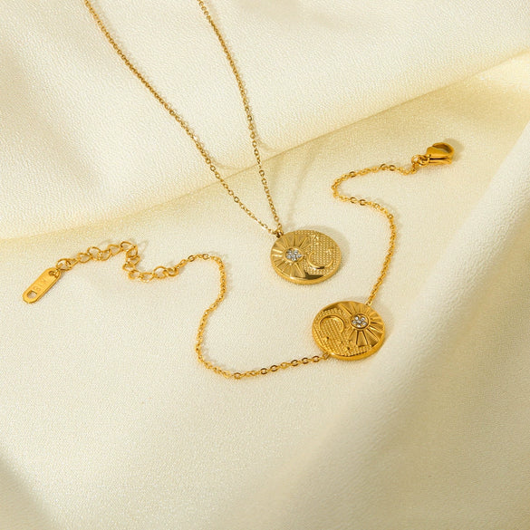 Wholesale Geometric Titanium Steel And Stainless Steel Electroplated Sun And Moon Embossed Round Pendant Necklace And Bracelet For Women