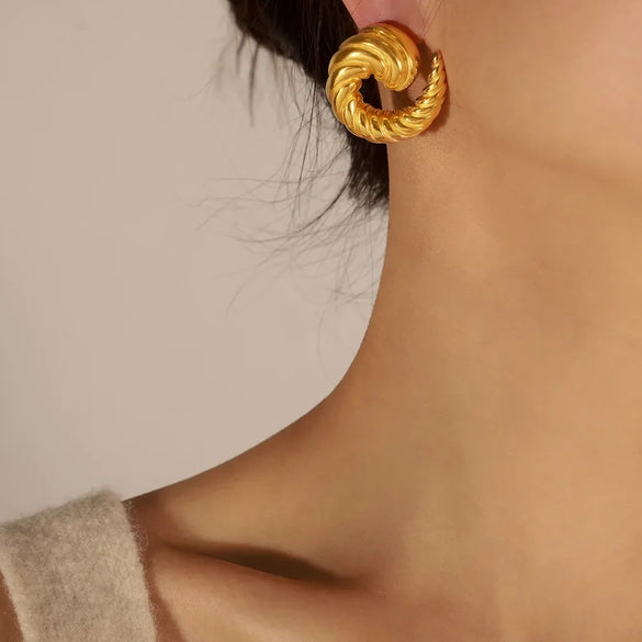 Wholesale Geometric Titanium Steel Goldplated Earrings With Line Twist Swing Design For Unisex