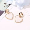 Wholesale Girls' Simple Geometric Love Earrings With Hollow Round Metal Pendant Alloy Electroplated