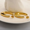 Wholesale Girls Simple Temperament Curved Titanium Steel Earrings With Letters Numbers Text Design And Electroplating