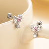 Wholesale Girls' Titanium Steel Bow Pendant Earrings With Electroplating Treatment Lovely Style