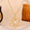 Wholesale Gold Electroplated Stainless Steel Hollow Flower Pendant Necklace With Cross Chain For Unisex