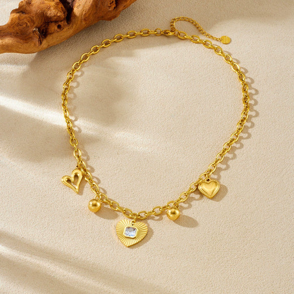 Wholesale Goldplated Stainless Steel Heart Shape Hollow Pendant With O Word Chain Necklace For Women