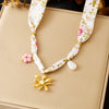 Wholesale Goldplated Stainless Steel Pendant Necklace With Leopard Print Small Floral And Heart Shape For Women