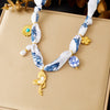 Wholesale Goldplated Stainless Steel Pendant Necklace With Leopard Print Small Floral And Heart Shape For Women