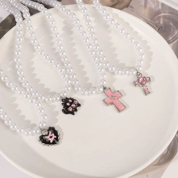 Wholesale Gothic Vintage Pink Cross Cat Pendant Imitation Pearl Beaded Alloy Necklace With Electroplating For Women Featuring Cartoon Characters Geometric And Animal Patterns