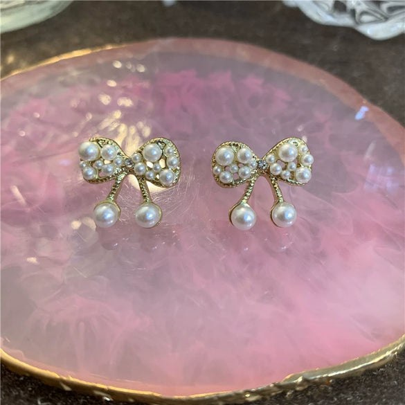 Wholesale Handmade Bowknot Pearl Earrings For Women Electroplated French Retro Cold Style