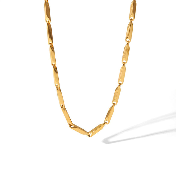 Wholesale Handmade Light Luxury Geometric Stainless Steel Jewelry Set With Strip Pattern And Electroplating Treatment Lingshaped Necklace And Bracelet For Unisex
