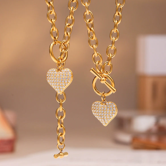 Wholesale Heart Pendant Ot Clasp Collarbone Necklace And Bracelet In Stainless Steel With Real Gold Plated Electroplating For Women