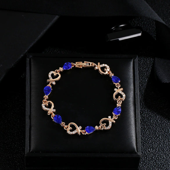 Wholesale Heart Shaped Copper Lady Bracelet With Hollow Out Elegant Flower And Diamond Embedded Design