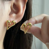 Wholesale High End Asymmetrical Heart Shaped Titanium Steel Earrings With Electroplating Non Fading French Retro And Fashion Ol Style
