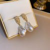 Wholesale Highend Feel Geometric Pearl Zircon Earrings With Electroplating