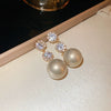 Wholesale Highend Feel Geometric Pearl Zircon Earrings With Electroplating