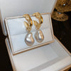 Wholesale Highend Feel Geometric Pearl Zircon Earrings With Electroplating