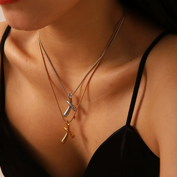 Wholesale Hiphop Female Stainless Steel And Titanium Steel Necklace With Cross Chain And Pendant In Letters Numbers Text Pattern And Pvd Furnace Real Gold Electroplating
