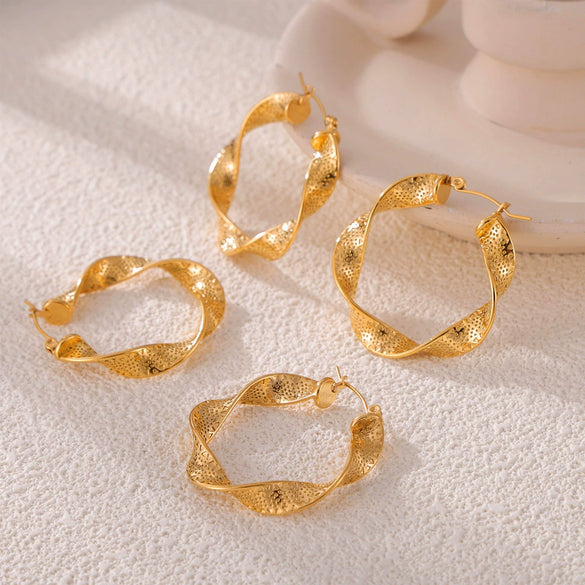 Wholesale Hiphop Style Simple Niche Texture 316L Stainless Steel Goldplated Geometric Earrings With Ribbon Twist Design