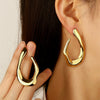 Wholesale Hiphop Style Titanium Steel Exaggerated Earrings With Geometric Ring Lines And Hollow Design Electroplated For Women