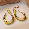 Wholesale Hiphop Style Titanium Steel Exaggerated Earrings With Geometric Ring Lines And Hollow Design Electroplated For Women